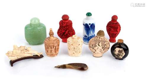 A GROUP OF NINE SNUFF BOTTLES AND A SMALL IVORY CA...