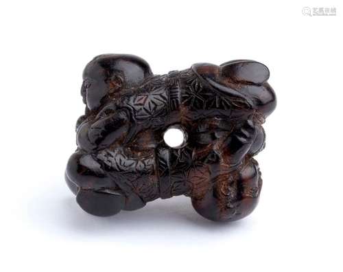 A WOOD NETSUKE OF TWO KARAKO 19th century unsigned...