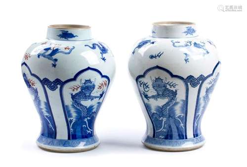 A PAIR OF ‘BLUE AND WHITE’ BALUSTER ‘DRAGON’ VASES...