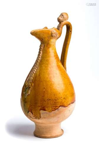 AN AMBER GLAZED EWER China, Liao dynasty 25 cm hig...