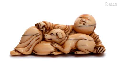 AN IVORY NETSUKE OF A CHINESEMAN AND DOG early 19t...