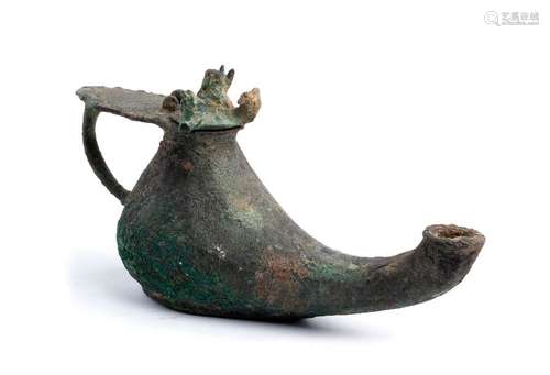 A BRONZE OIL LAMP, CHERAGH Iran, Khorasan, 12th – ...