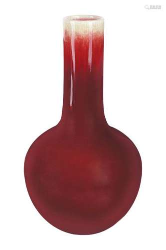 A RED GLAZED BOTTLE VASE China, Qing dynasty, 18th...