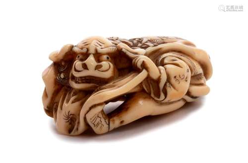 AN IVORY NETSUKE OF SHISHIMAI 19th century signed ...