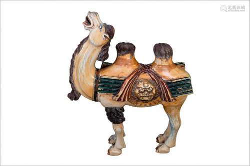 A LARGE PAINTED IVORY CARVING OF A CAMEL China, ea...