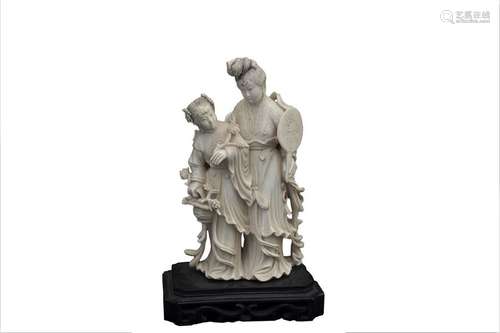 AN IVORY CARVING OF TWO STANDING FEMALE FIGURES Ch...