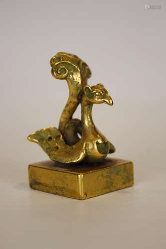 A GILT BRONZE BEAST SEAL