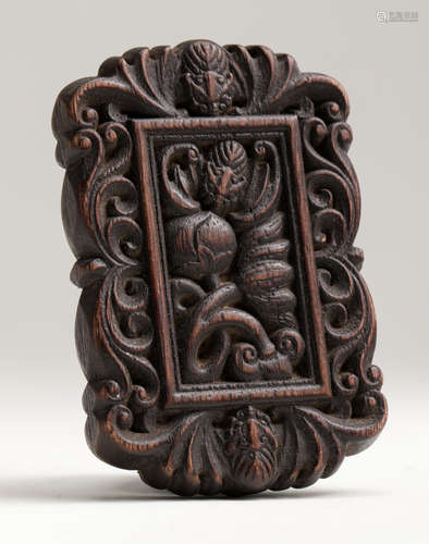 AN CARVED EAGLEWOOD PENDANT