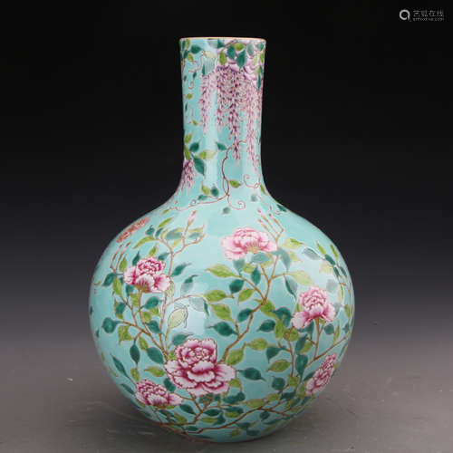 A GREEN GLAZED FAMILLE ROSE VASE