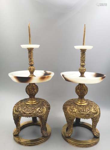 A PAIR OF GILT BRONZE INLAD JADE CANDLE STANDS