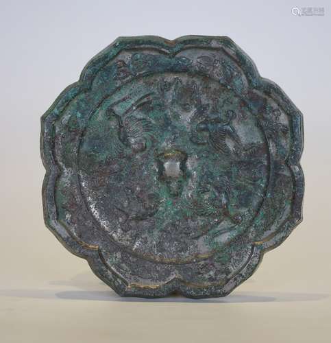 A TANG STYLE BRONZE MIRROR