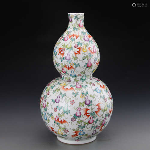 QIANLONG MARK, A FAMILLE ROSE GOURD VASE