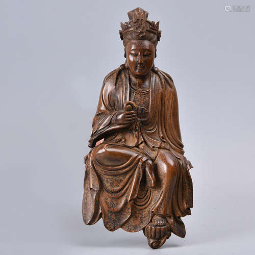 A CARVED BOXWOOD GUANYIN STATUE