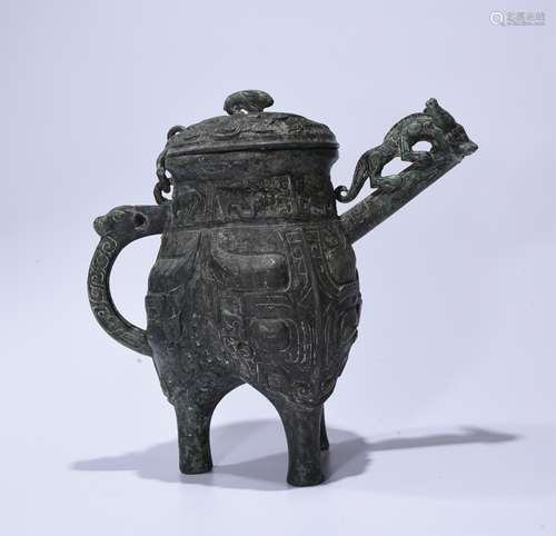 A BRONZE TRIPOD CUP