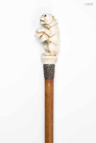 SpazierstockEngland, 1889. Hoher Elfenbeingriff plastisch geschnitzt in Form eines Boxers bei seiner