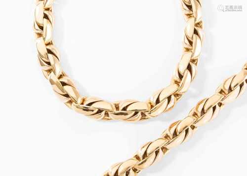 Bicolor-Collier mit BraceletBucherer. 750 Gelb- und Rotgold, poliert. Fantansieform. L 42/20 cm.