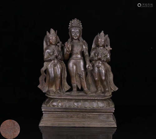 A BRONZE MOLDED THREE BUDDHAS STUTUE