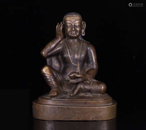 A BRONZE BUDDHA STATUE