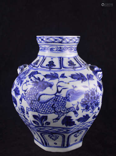 A BLUE AND WHITE BEAST PATTERN JAR