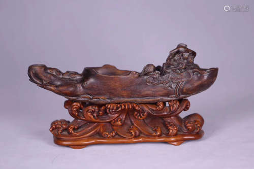 A CHENXIANG WOOD CARVED BOAT SHAPED ORNAMENT