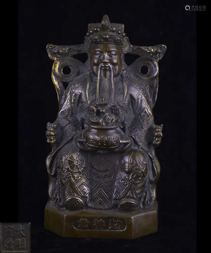 A BRONZE MOLDED MONEY-BUDDHA STATUE