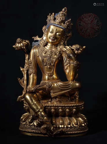 A GILT BRONZE GREEN TARA BUDDHA