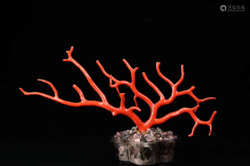 A TREE BRANCH SHAPED CORAL ORNAMENT