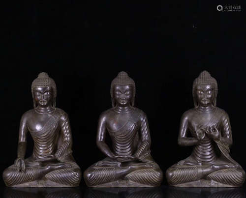 THREE BRONZE MOLDED BUDDHA STATUES