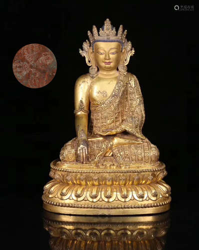 A TIBETAN GILT BRONZE LIFELESS BUDDHA