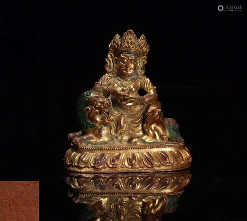 A GILT BRONZE MOLDED WENSHU BUDDHA STATUE