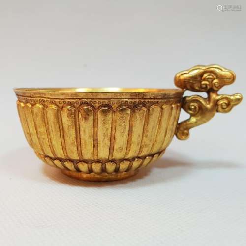 A CARVED GILT-GOLD CUP ,TANG PERIOD