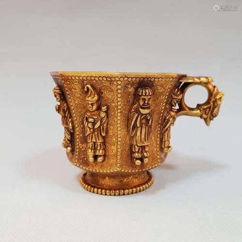 A CARVED GOLD CUP ,TANG PERIOD