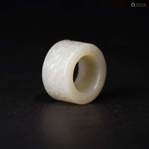 A CARVED WHITE JADE ARCHER'S RING ,QING DYNASTY