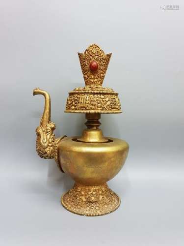 A TIBET GILT-SILVER DRAGON TEAPOT AND COVER ,QING