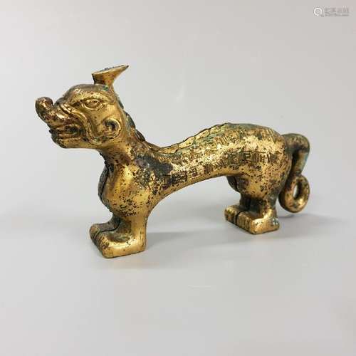 A CARVED GILT-BRONZE TIGER ,MING DYNASTY