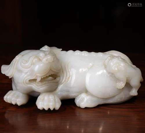 A CARVED WHITE JADE LION GROUP ,QING DYNASTY