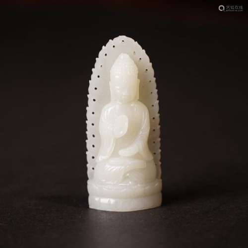 A CARVED WHITE JADE SAKYAMUNI ,QING DYNASTY