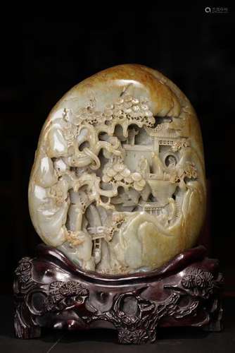 A CARVED RUSSET JADE BOULDER