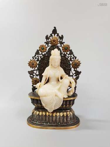 A CARVED WHITE JADE GUANYIN AND STAND ,QING DYNASTY