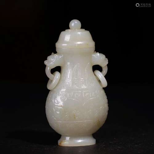 A CARVED WHITE JADE VASE AND COVER ,QING DYNASTY