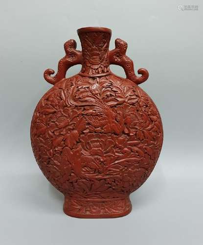 A CARVED CINNABAR LACQUER MOONFLASK ,QING DYNASTY