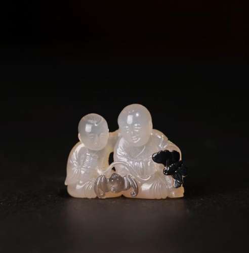 A CARVED AGATE BOY'S GROUP ,QING DYNASTY