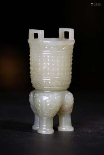 A CARVED WHITE JADE VESSEL .DING ,QING DYNASTY