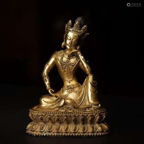 A GILT-BRONZE FIGURE OF GUANYIN ,16th CENTURY