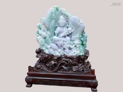 A JADEITE CARVING OF GUANYIN