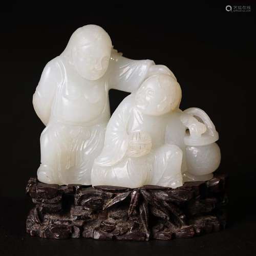 A CARVED WHITE JADE 'IMMORTALS' GROUP ,QING DYNASTY