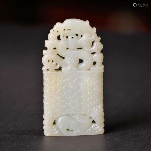 A CARVED WHITE JADE 'DRAGON' PENDANT ,QING DYNASTY