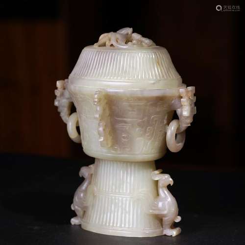 A CARVED WHITE JADE VESSEL AND COVER.DING ,QING DYNASTY