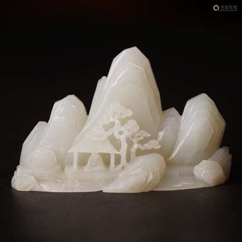 A CARVED WHITE JADE 'LANDSCAPE' BOULDER ,QING DYNASTY