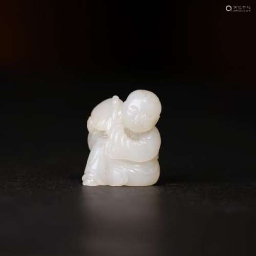 A CARVED WHITE JADE BOY ,QING DYNASTY